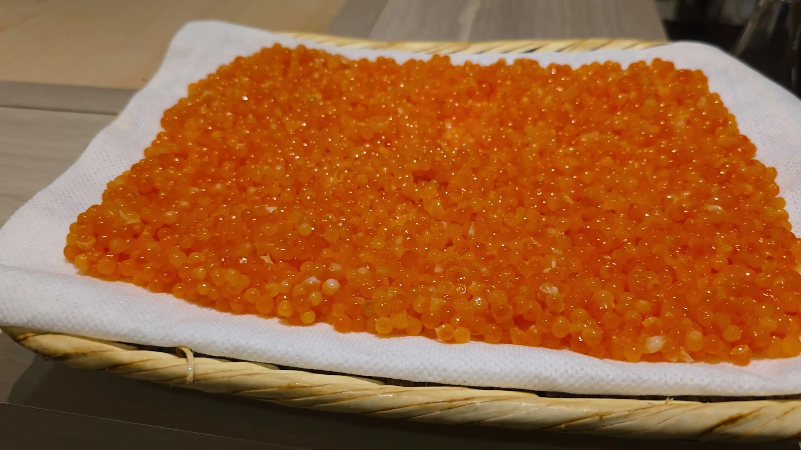 A whole basket of marinated ikura on the Shimazu counter